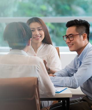 Три сотрудника компании Xiaomi работают